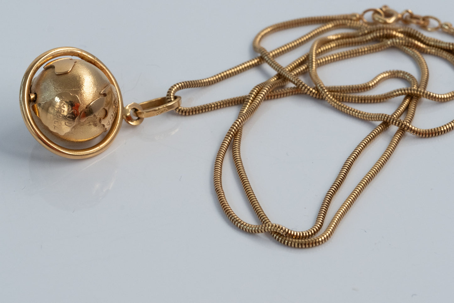 Vintage 18K Spinning Globe Pendant - 14K Snake Chain - Premium necklace from All The Best Vintage - Just $2995! Shop now at All The Best Vintage